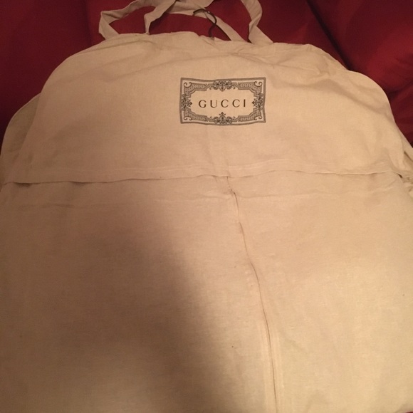 Gucci large canvas garment bag. Brand new. Authentic. Never used. Zip front.